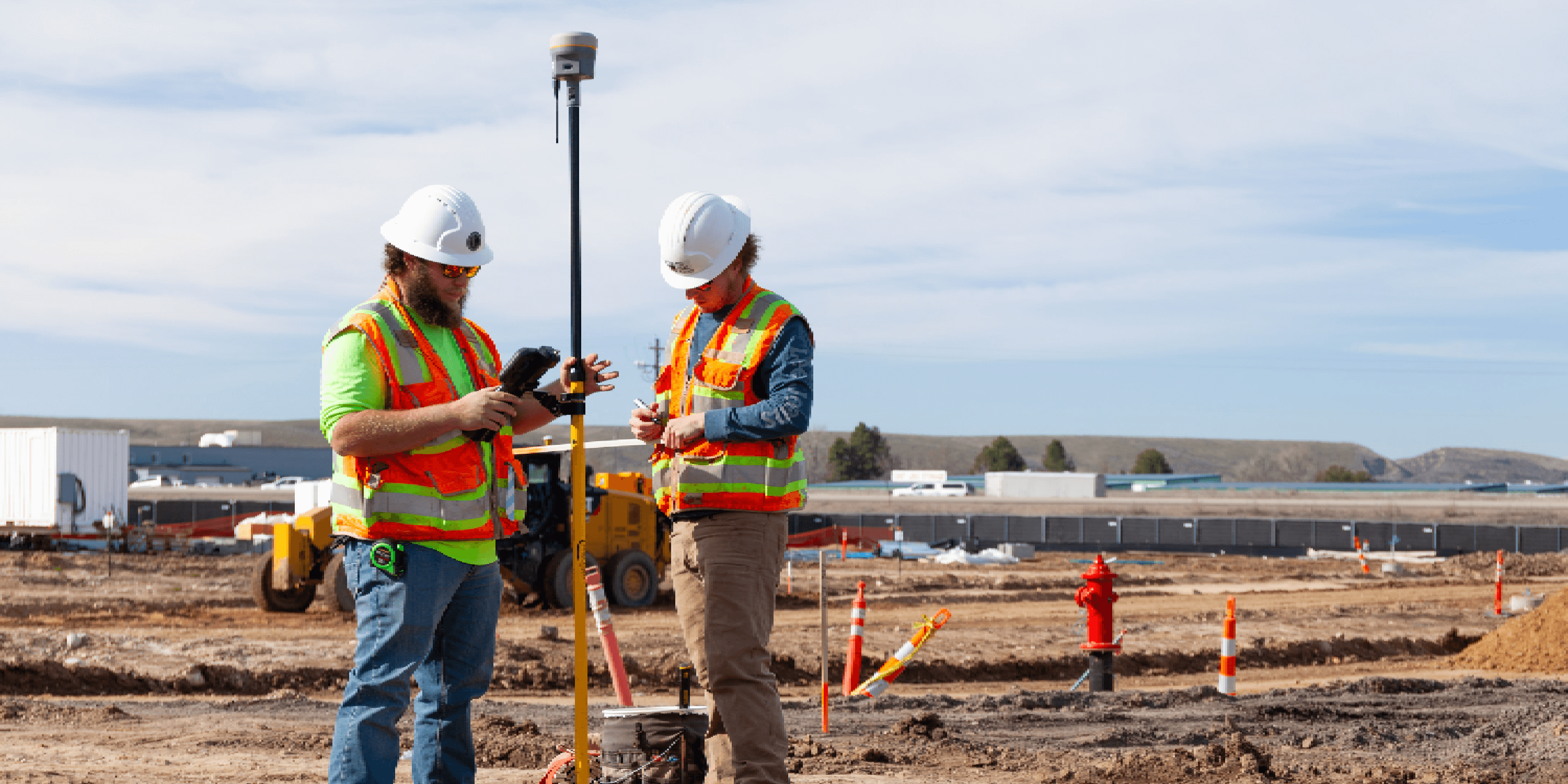 Land surveyors working on site